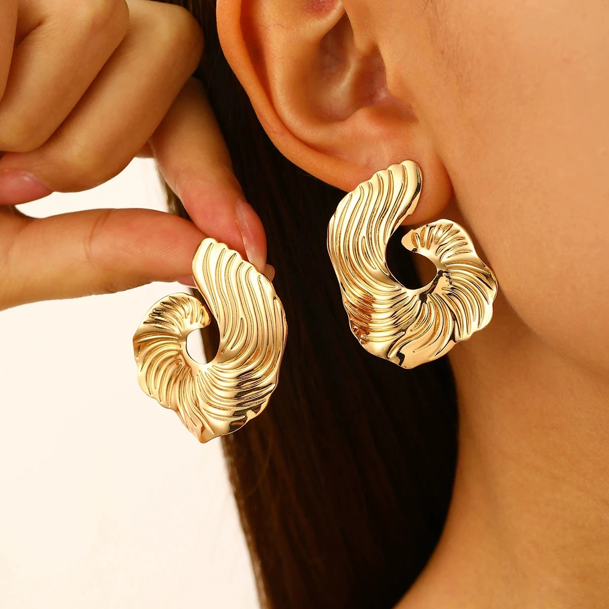 Vexa Sculpted Metal Stud Earrings